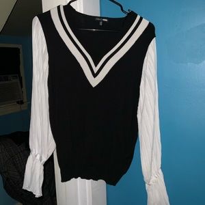 Classic black and white sweater with puffy arms